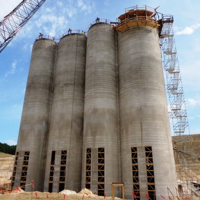 Four grain silos.