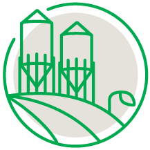 agriculture icon with silos, grass and leaf