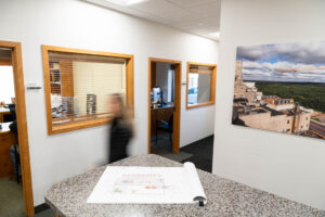 Woman walking through office
